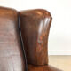 Dark brown sheep leather wingback armchair