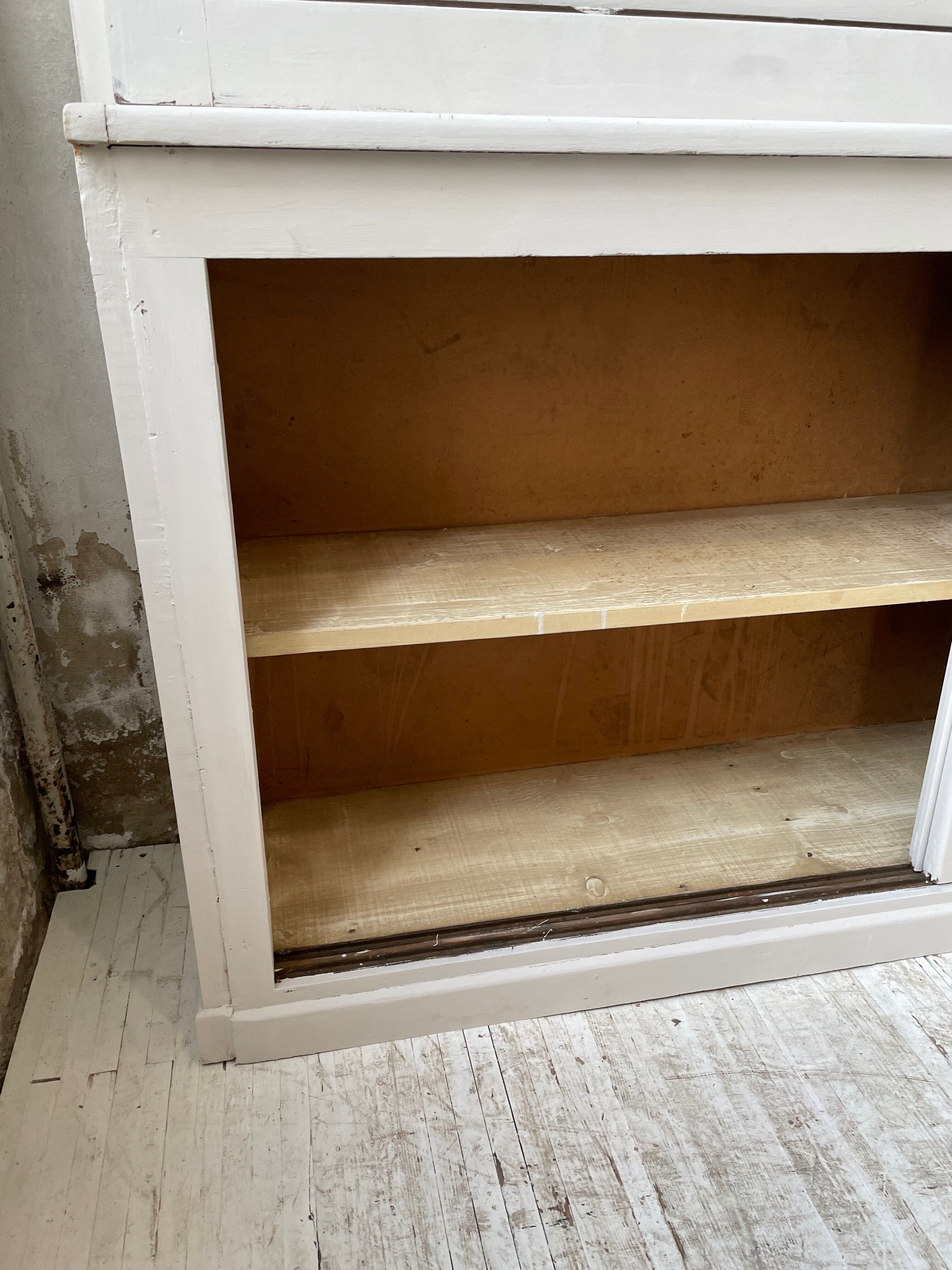 Library showcase ivory white sliding doors