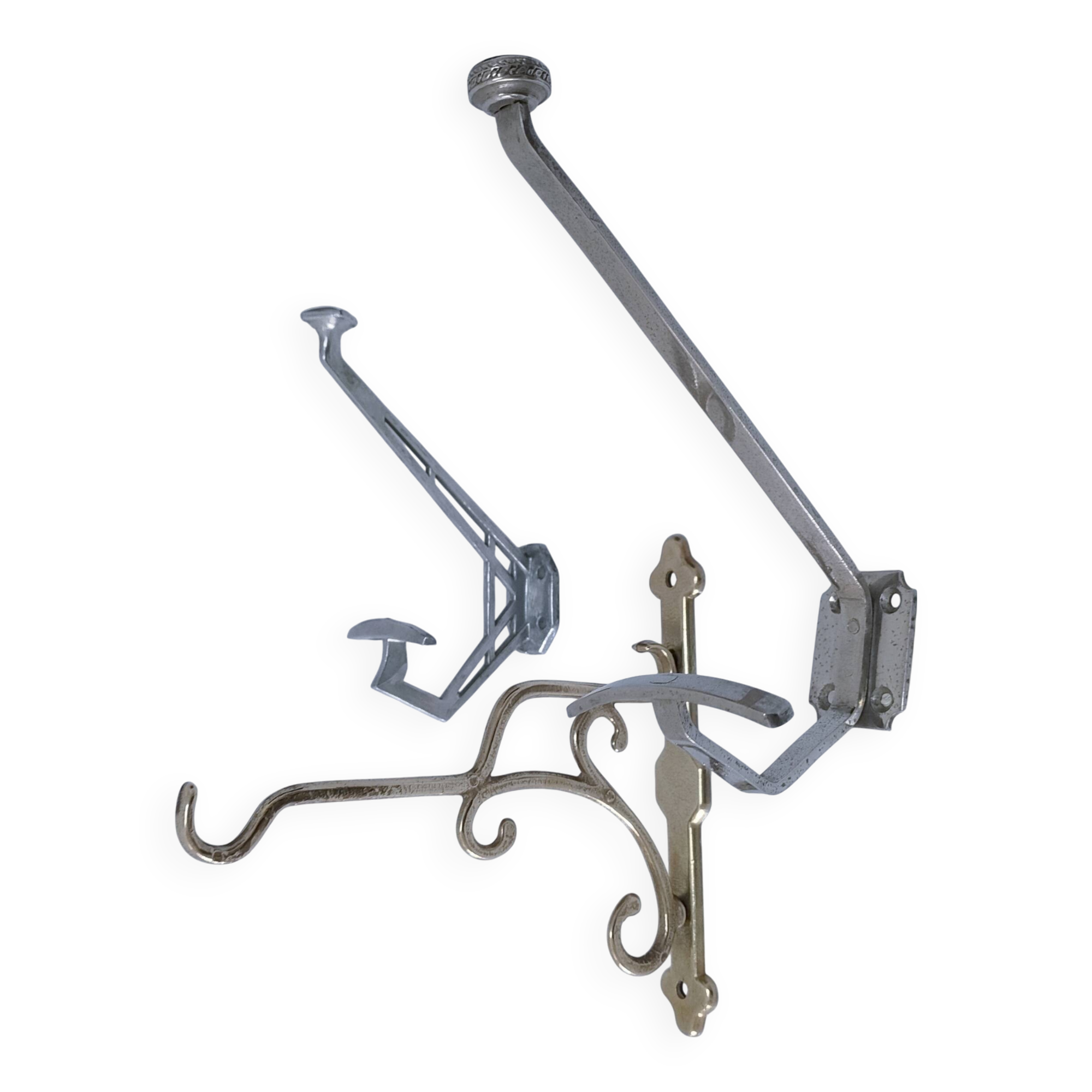 Three brass, chrome, aluminum hooks, early 20th century