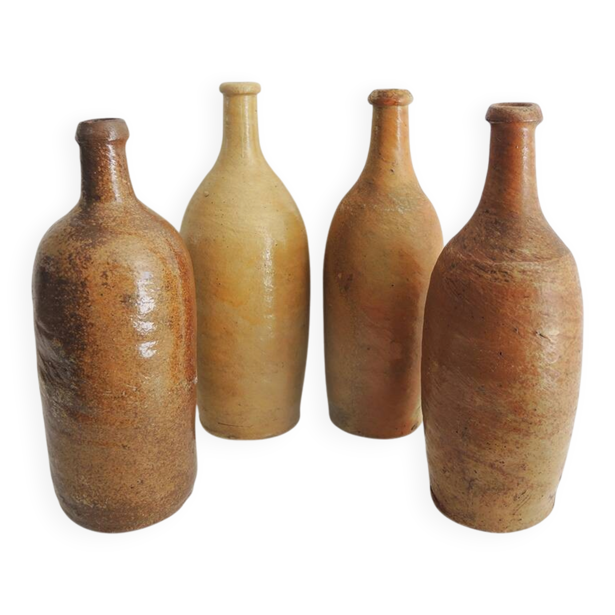 4 old stoneware bottles