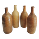 4 old stoneware bottles