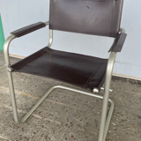 Fauteuil en cuir ancien
