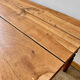 Antique coffee table in solid elm with turned legs.
