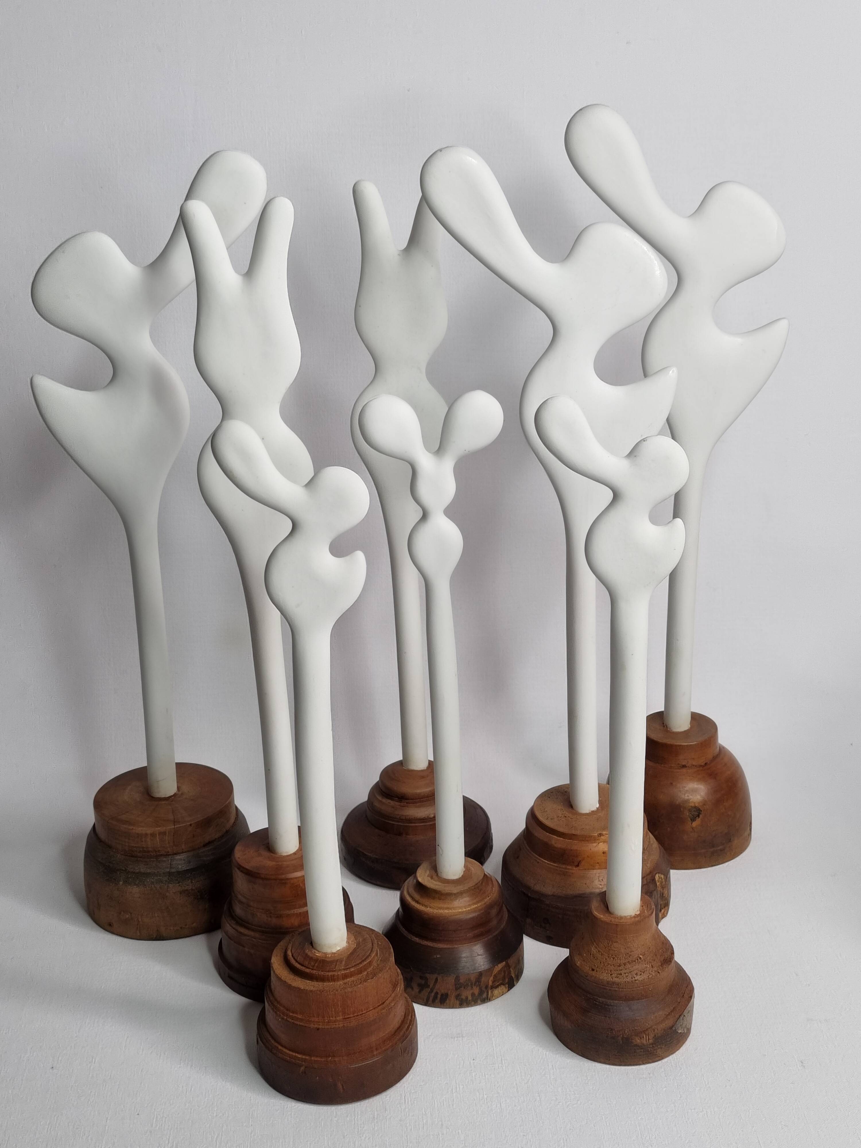 Biomorphic-inspired sculpture, on an industrial wooden base, 37 cm