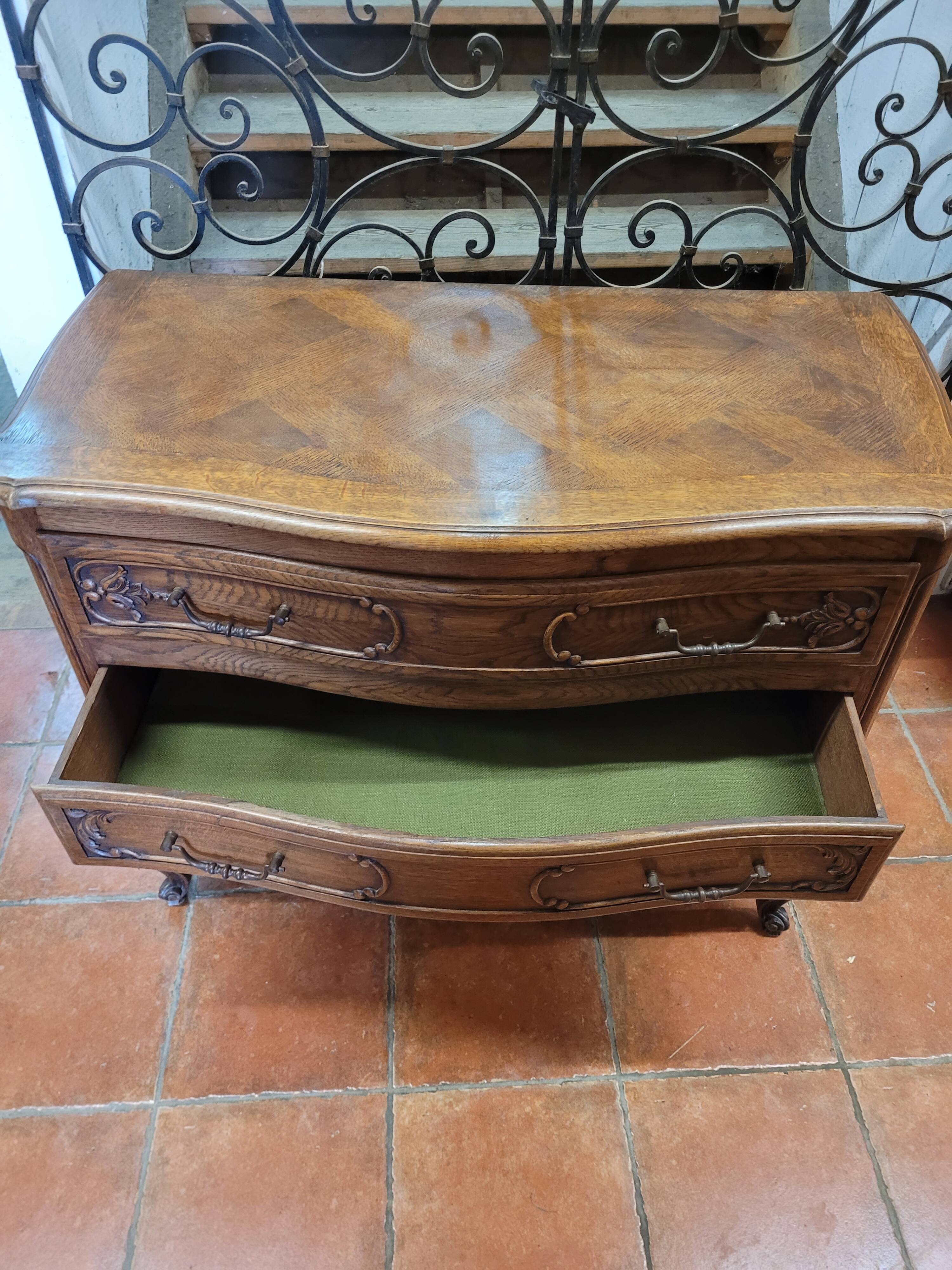 Curved oak chest of drawers in Louis XV style