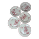 Set of five flat Fontanges plates.