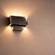 French-origin wall light, made of stainless steel.