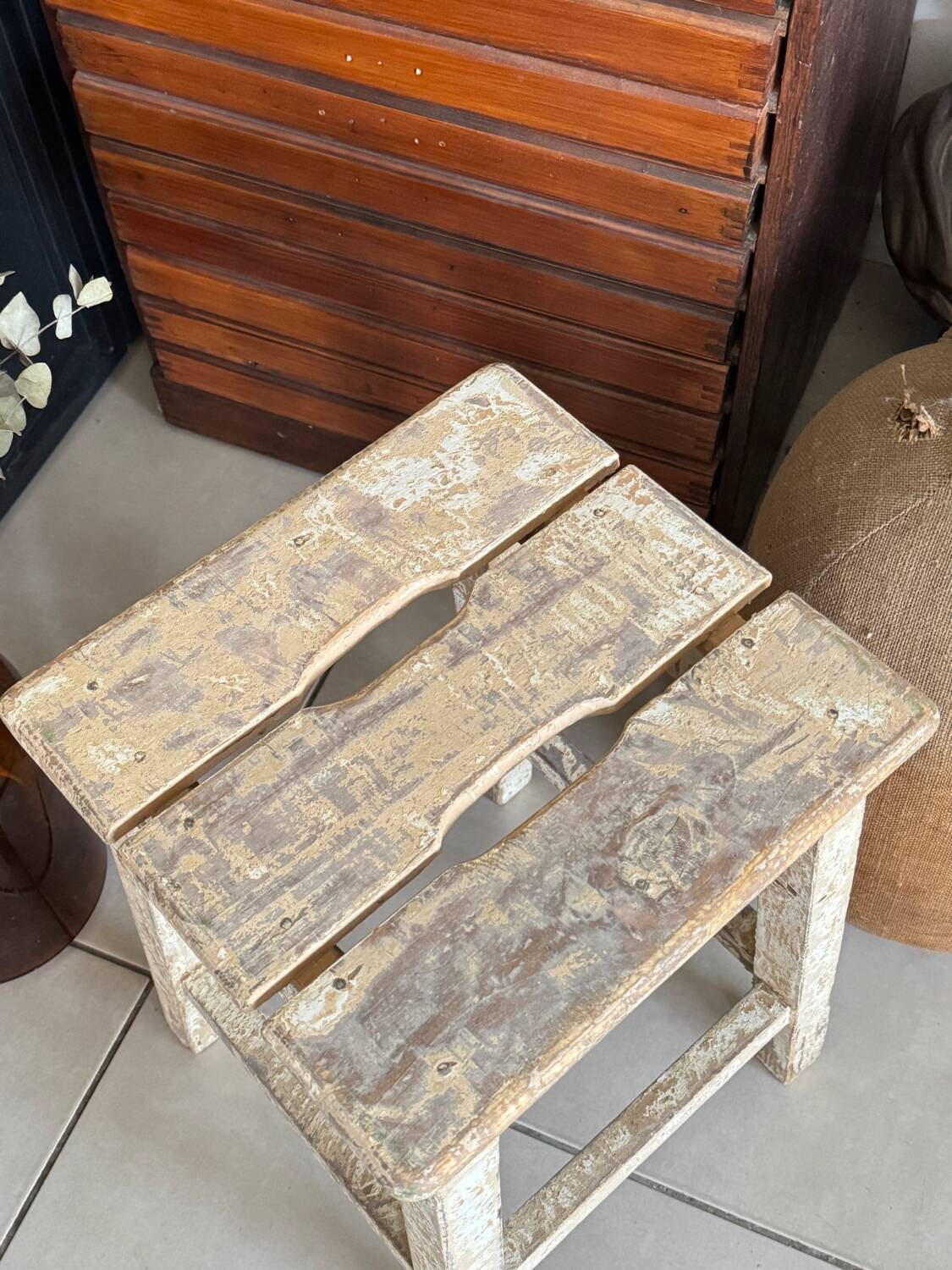 Old wooden stool with square seat
