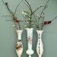 Set of 3 vintage vases/soliflores in white opaline with floral decorations.