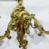 Pair of 2-light bronze wall lights, St. Louis XV