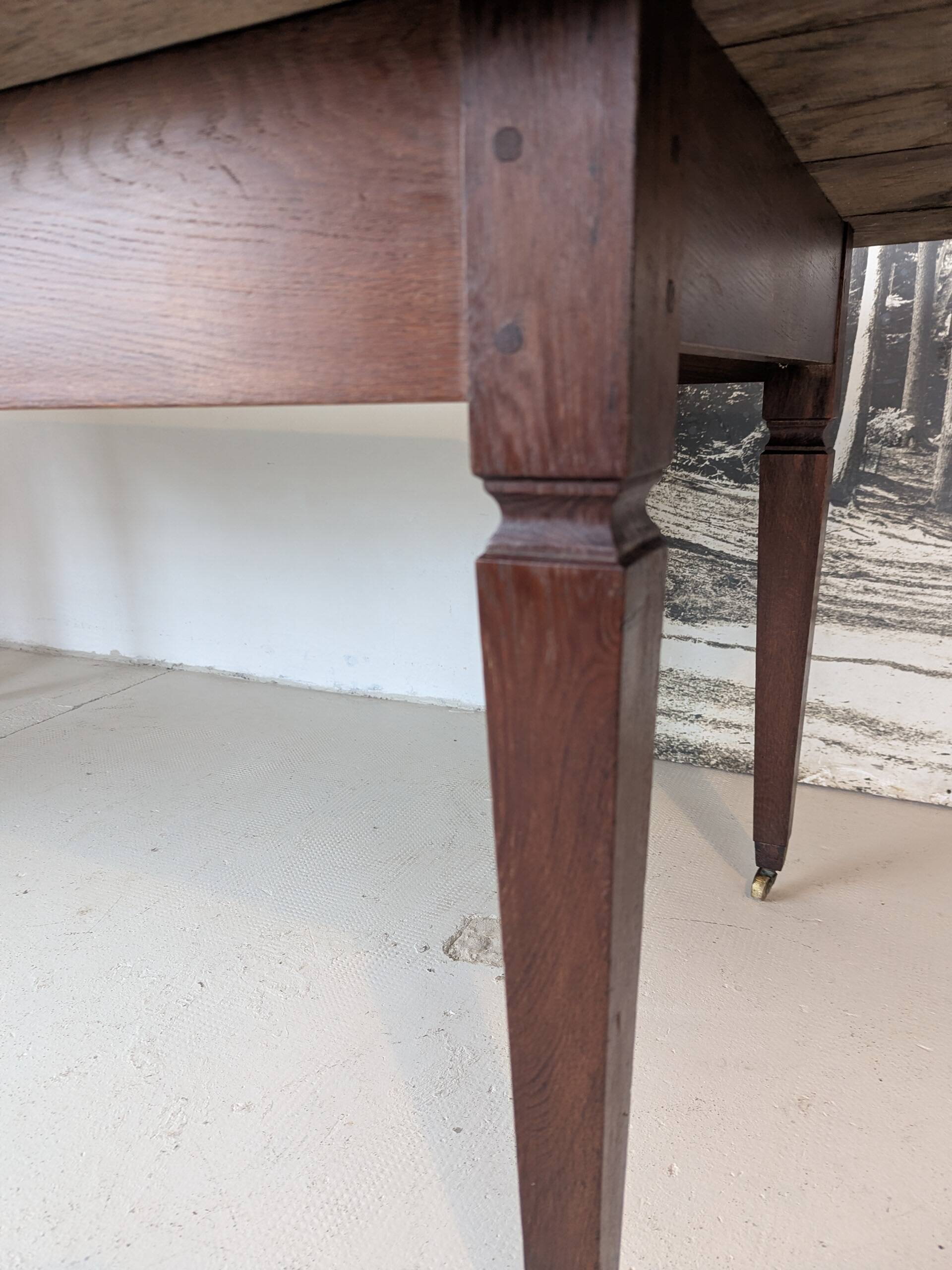 Campaign table in solid oak, Directoire style.