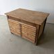 Low workshop cabinet with 8 drawers in solid wood, printing style.