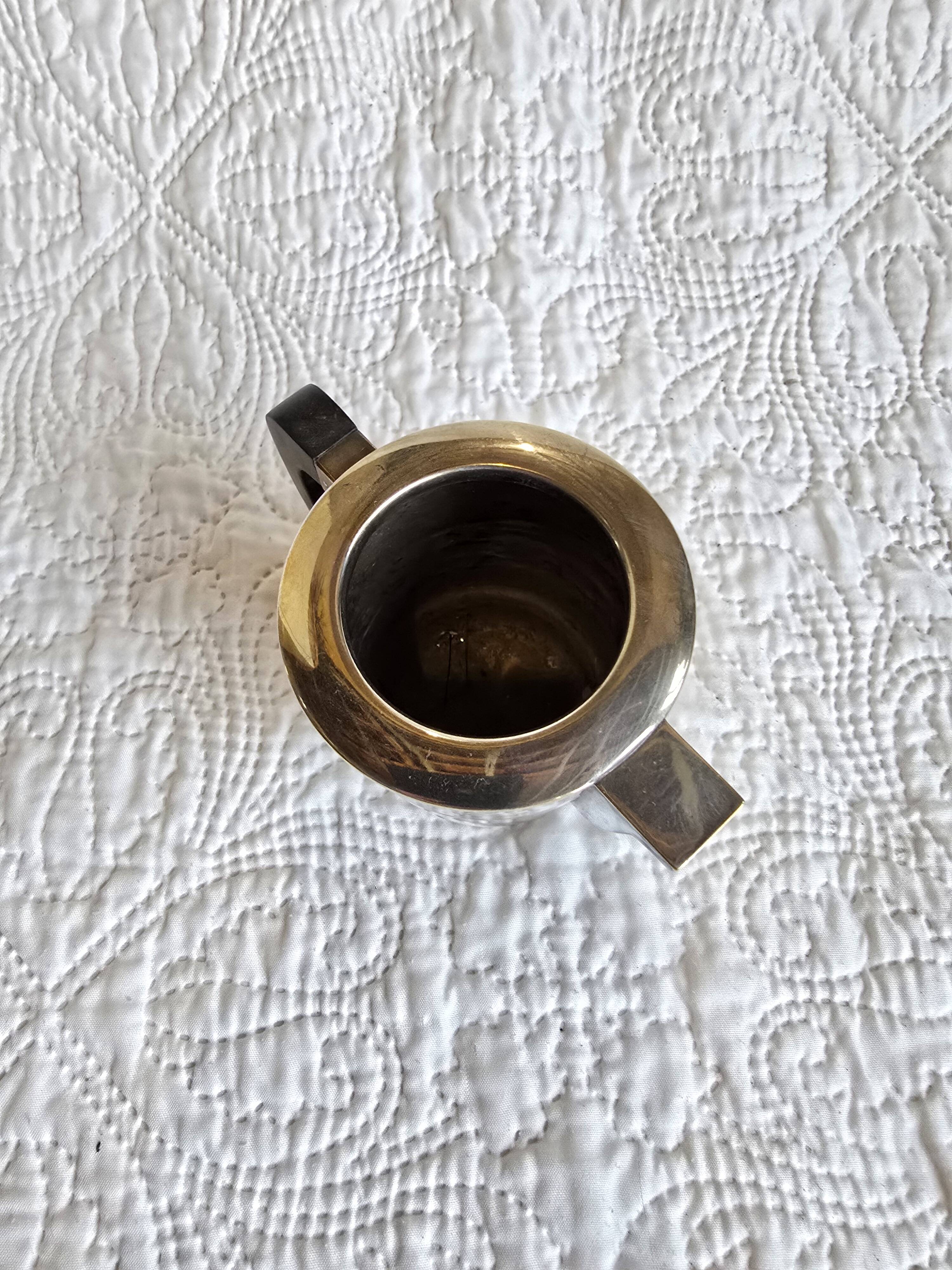 Service à thé et café Art déco en métal argenté et bakélite, années 1930