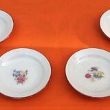 Suite de 4 assiettes anciennes de dinette Porcelaine décor foral    ​​​​​
