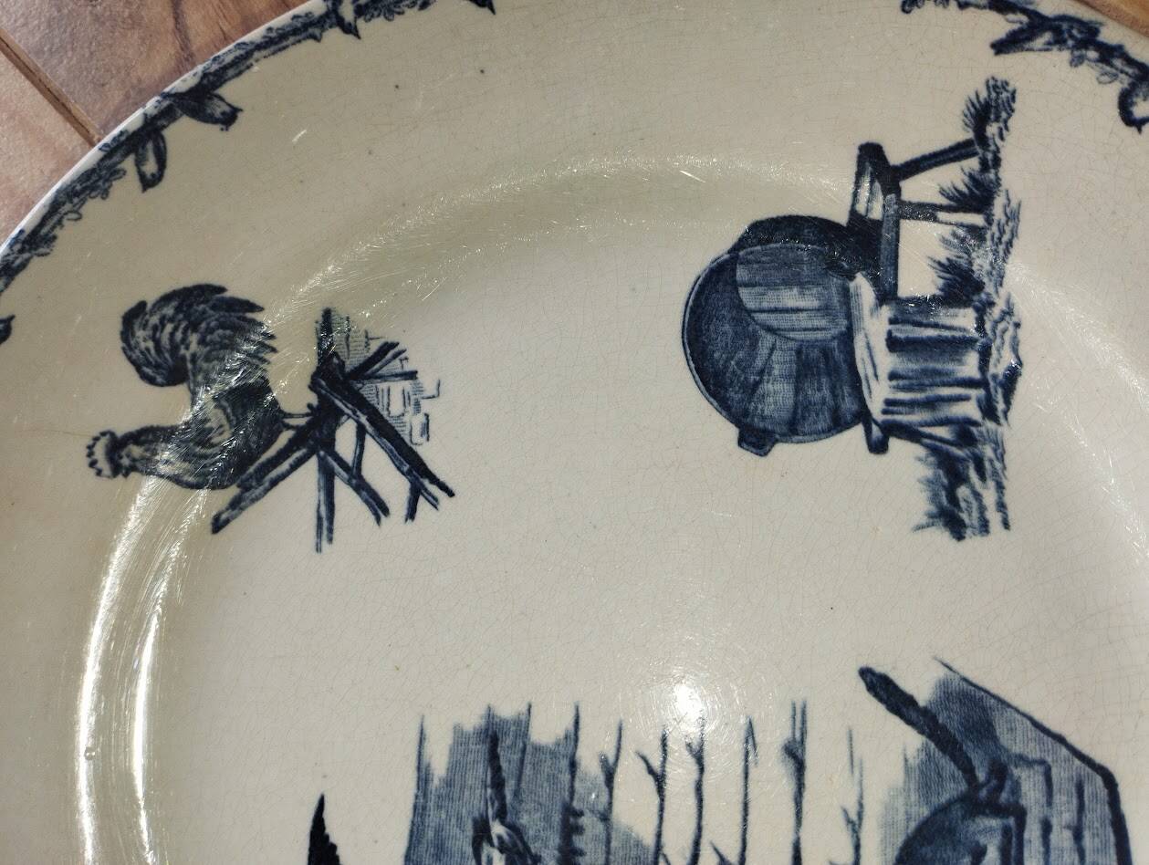 Assiettes Terre de Fer – Décor pastoral bleu – XIXe