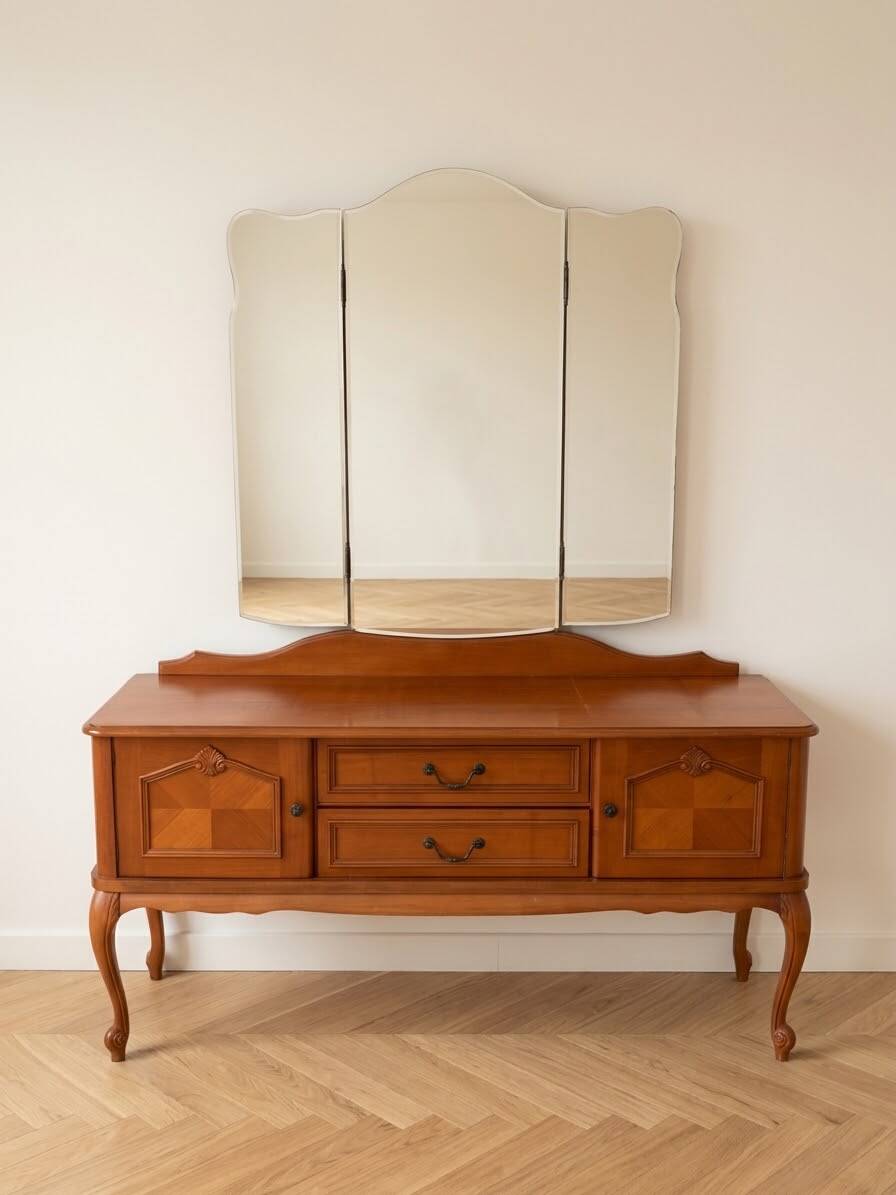 Antique wooden dressing table with a triptych mirror.