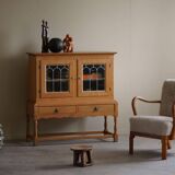 20th-century solid oak display cabinet with a glass front, by a Danish cabinetmaker.