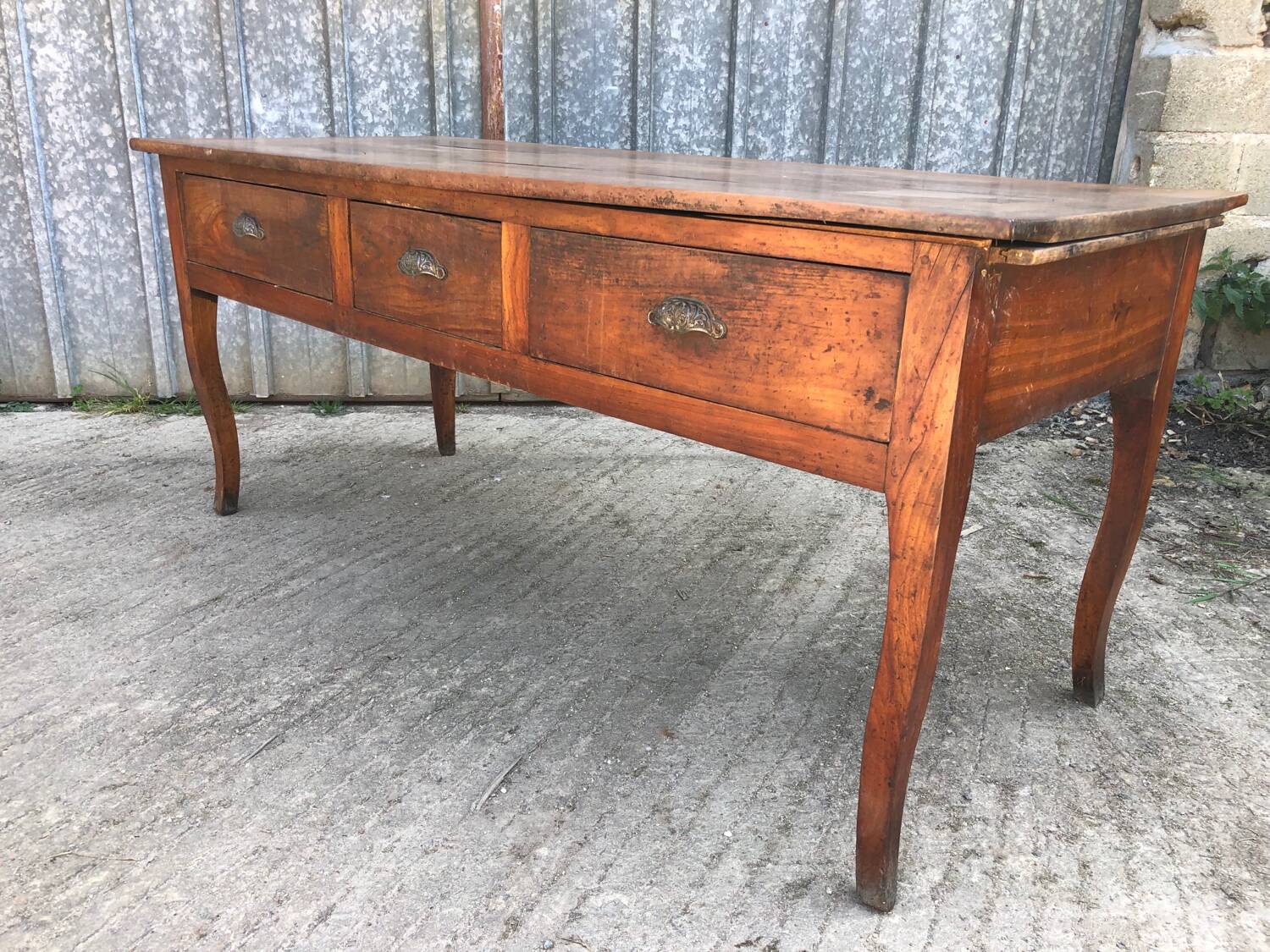 Antique solid cherry farmhouse table with 3 drawers and 2 pulls