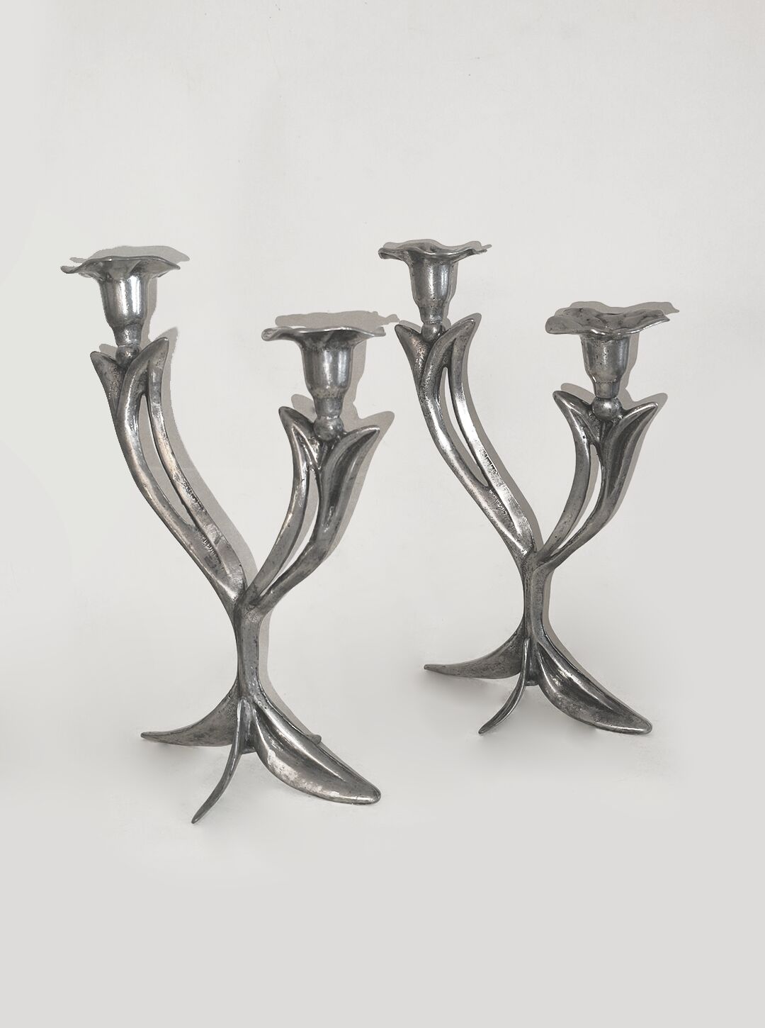 Pair of floral Art Nouveau candlesticks