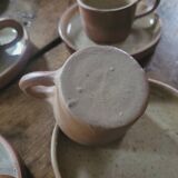 Genuine stoneware cups and saucers