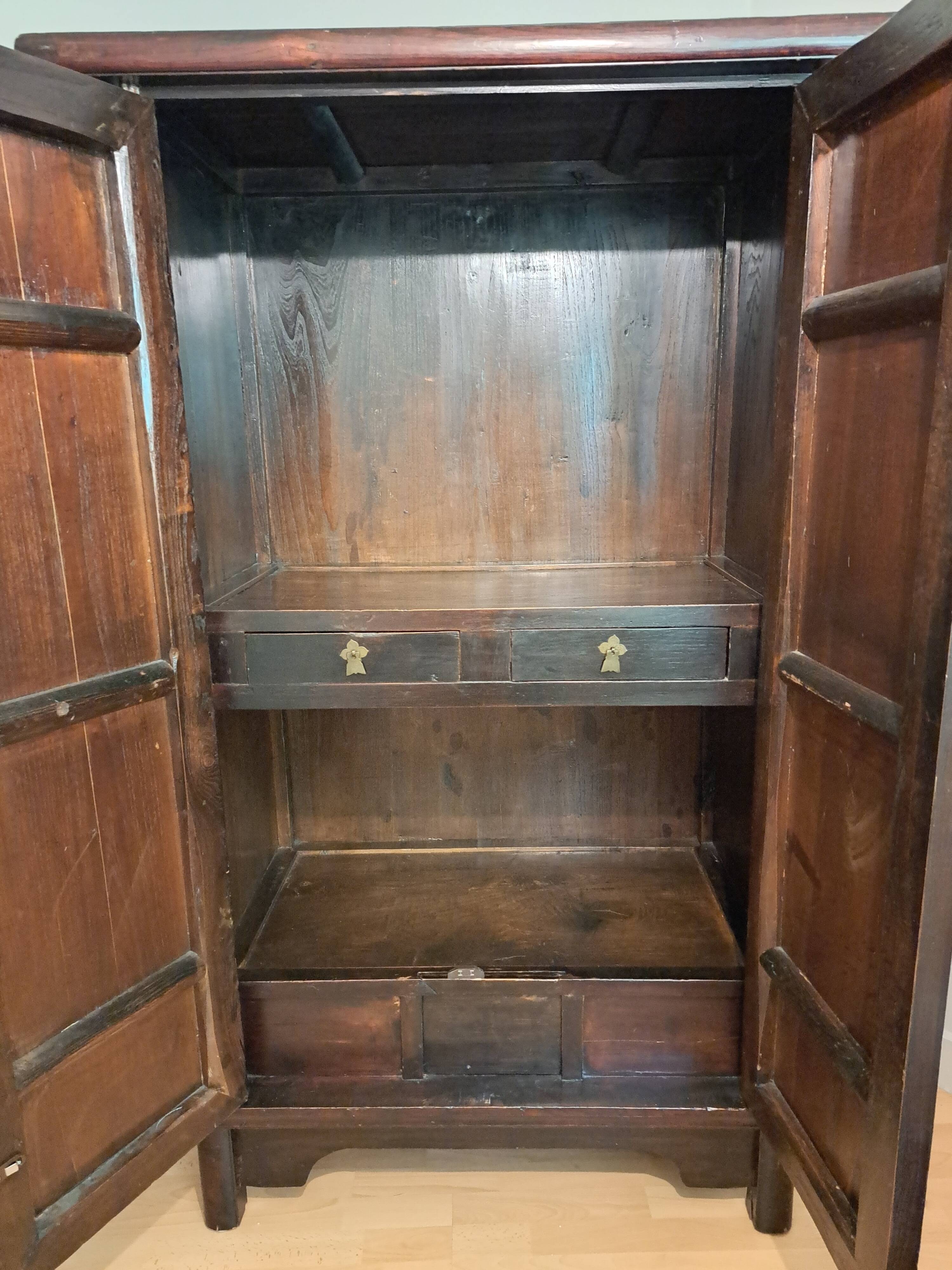 Brown lacquered Chinese wardrobe from Shandong.