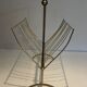 Brass and wood magazine rack, in the style of Cesare Lacca.