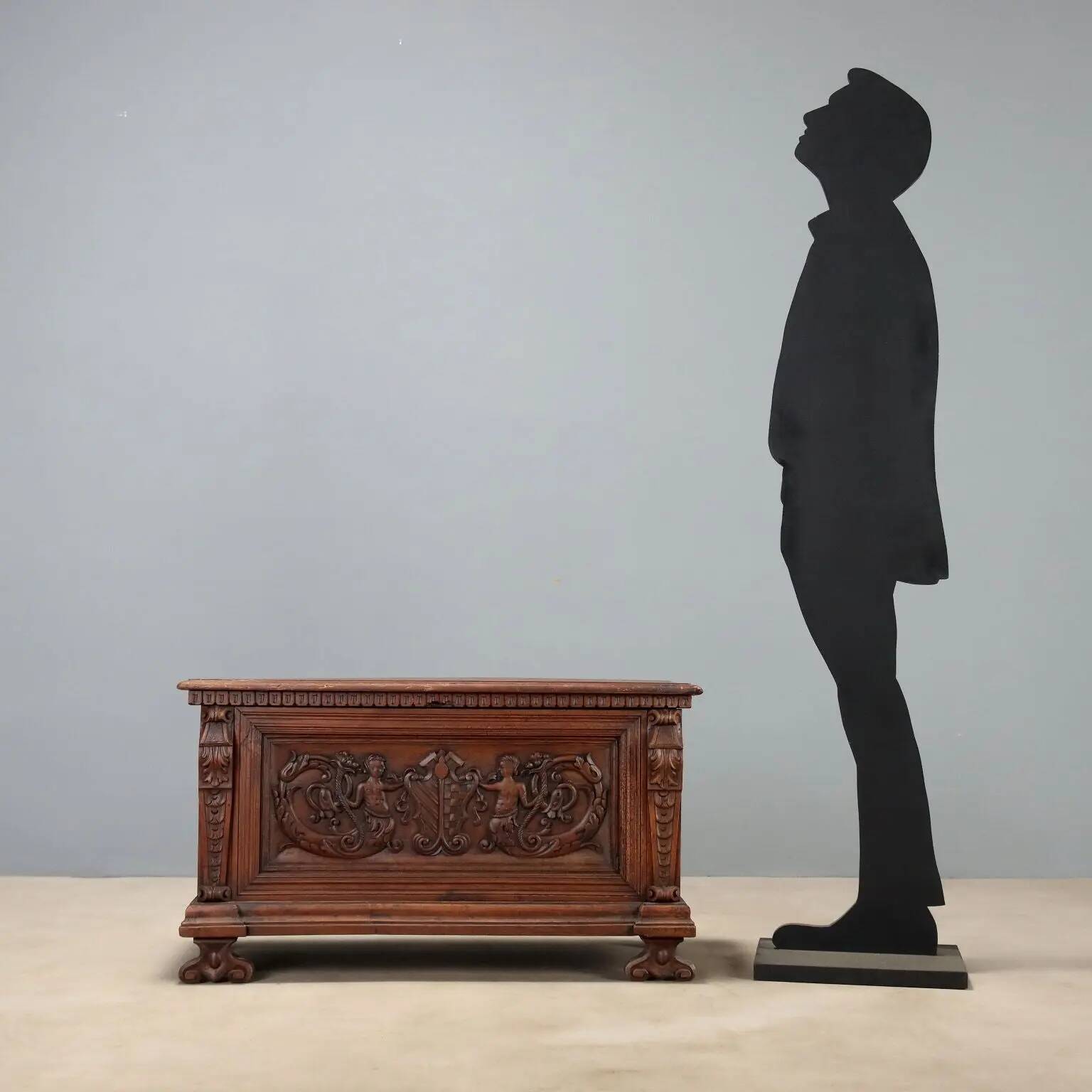 Walnut chest with baroque carvings