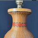 Vintage 1970s Chinese lamp base in woven bamboo on a porcelain vase