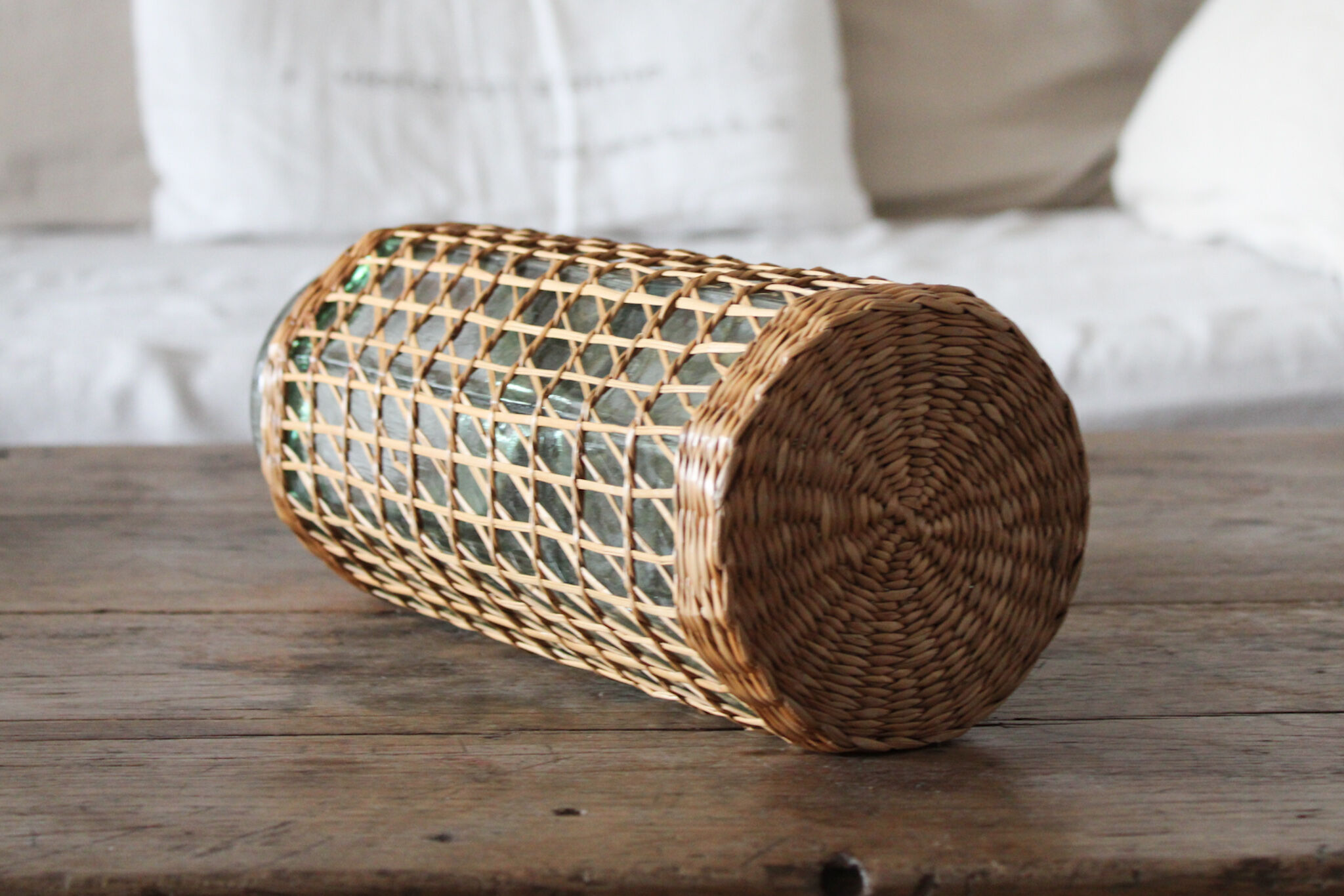 Glass and wicker vase