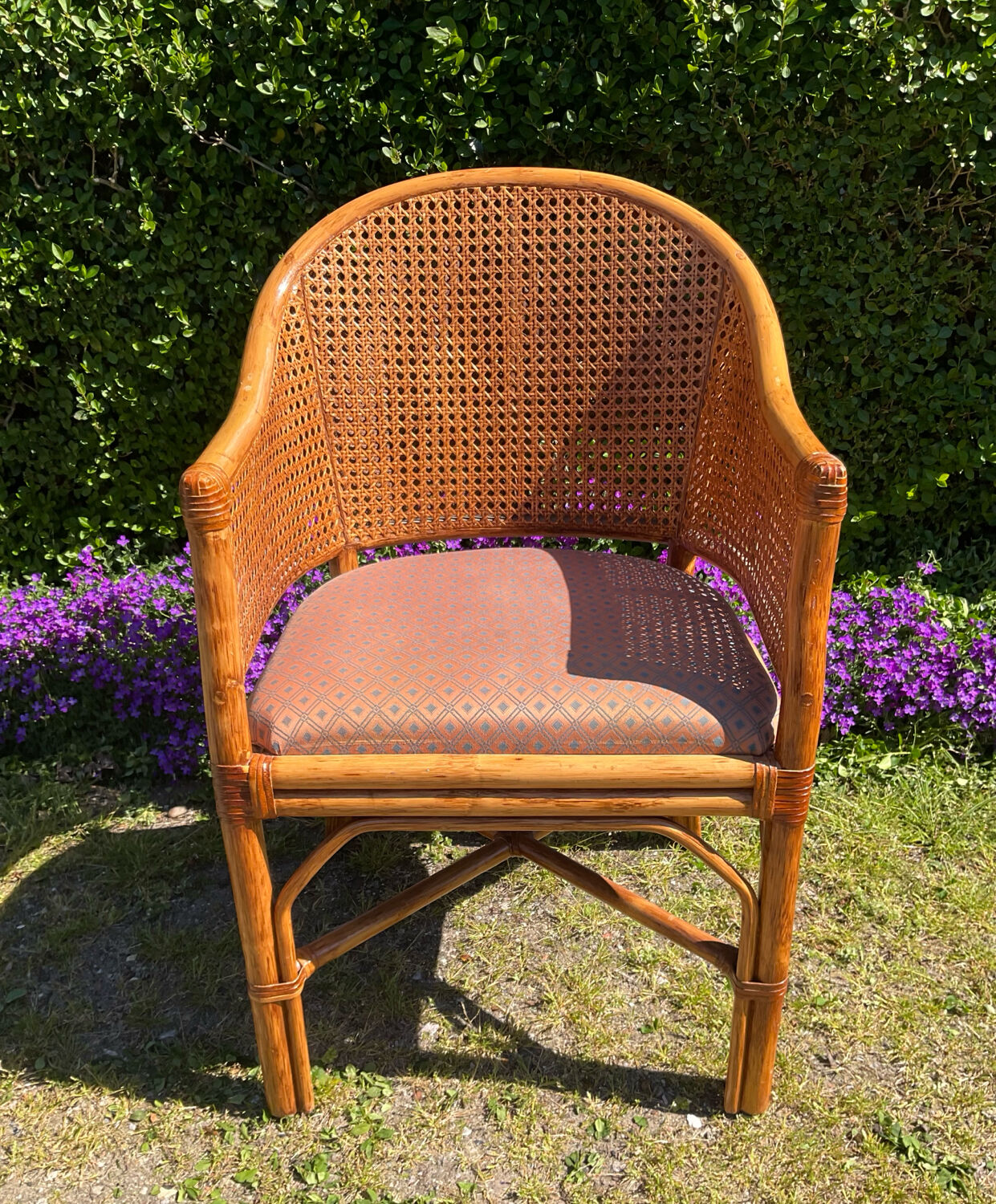 Mc Guire style armchair in rattan and caning from the 1980s.