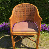 Mc Guire style armchair in rattan and caning from the 1980s.