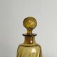 Twisted amber glass carafe