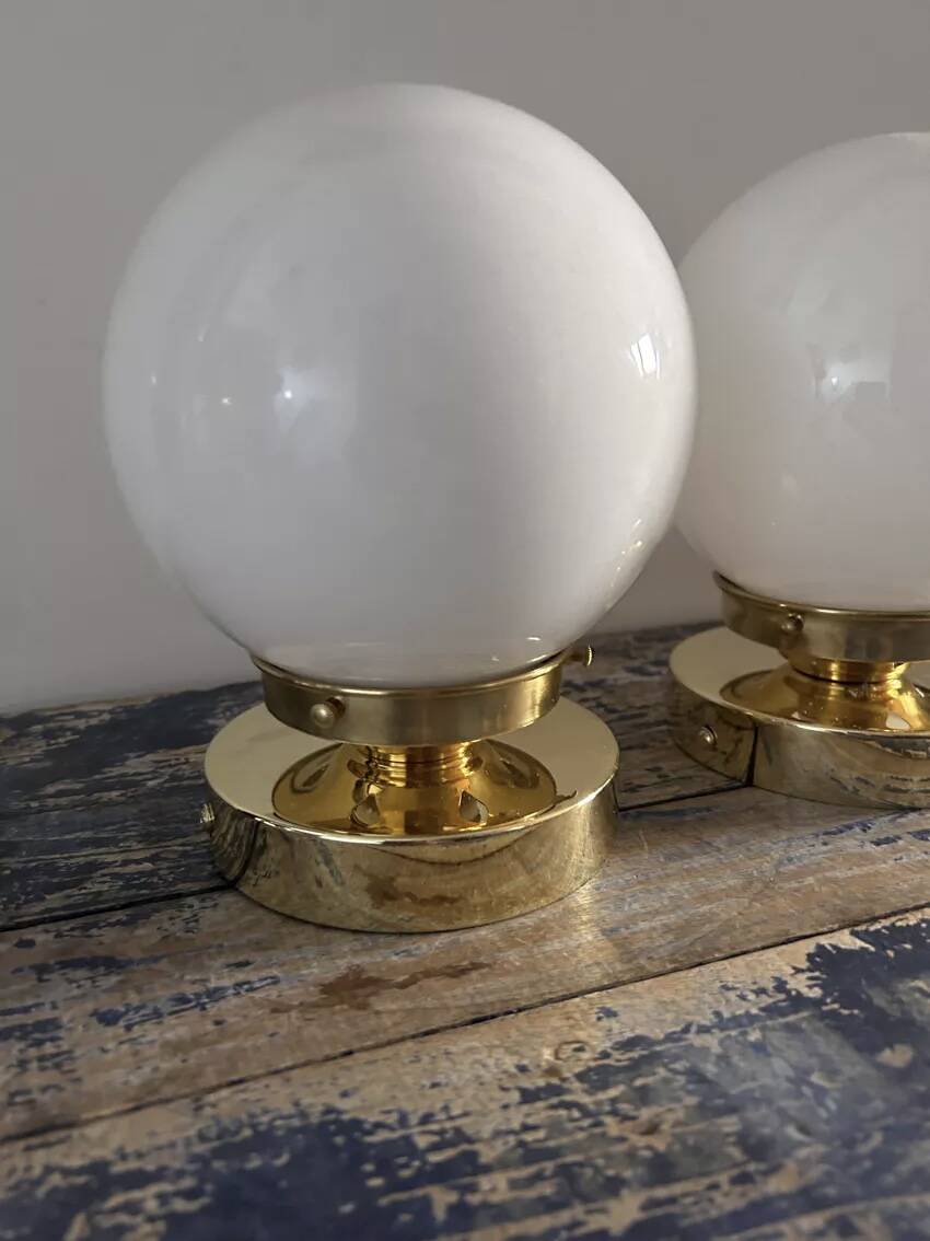Set of two white opaline ball wall lights