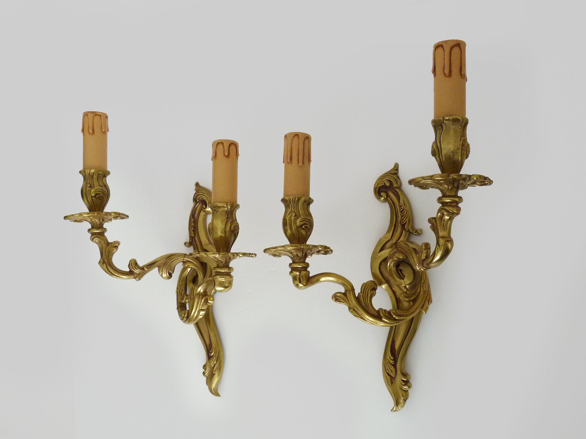 Old pair of wall sconces with double fires in bronze, 50s