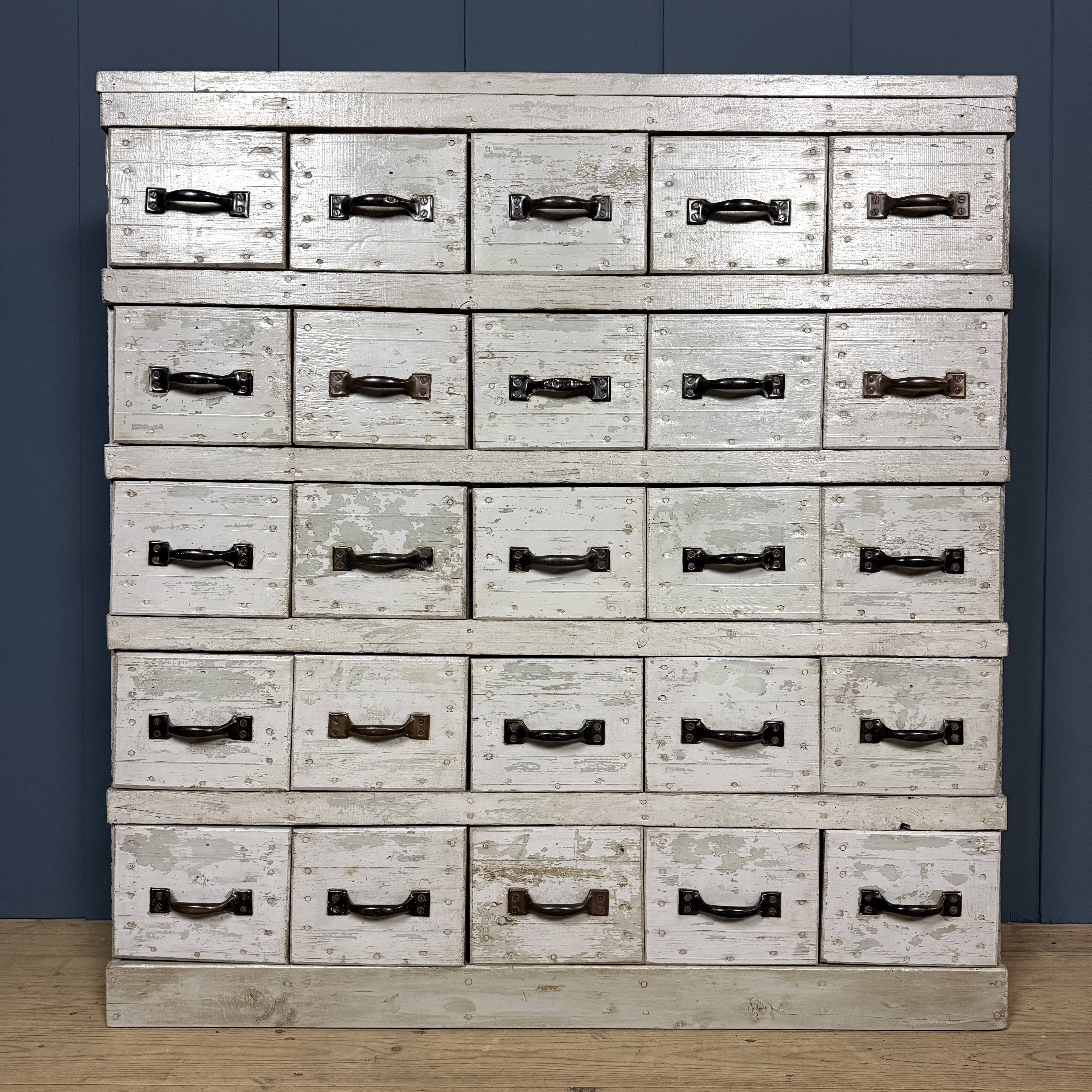 Old light grey workshop drawer cabinet with 25 drawers