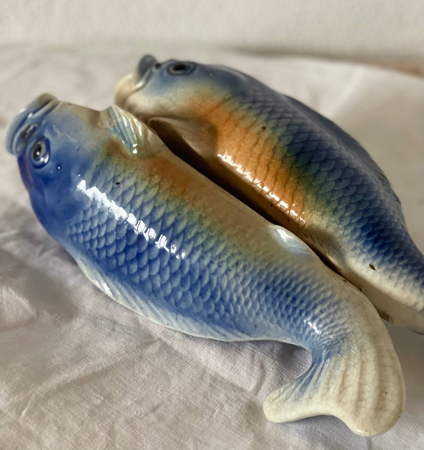 2 fish slip vases