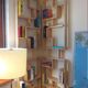 Two screens, partition walls, curved beech wood shelves.