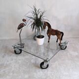 Beautiful designer glass coffee table on wheels
