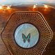 Rattan basket/tray/coin tray with a collection butterfly.