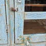 Antique glass-fronted buffet in Burmese teak