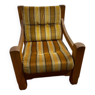 Fauteuil design brutaliste en chêne ancien