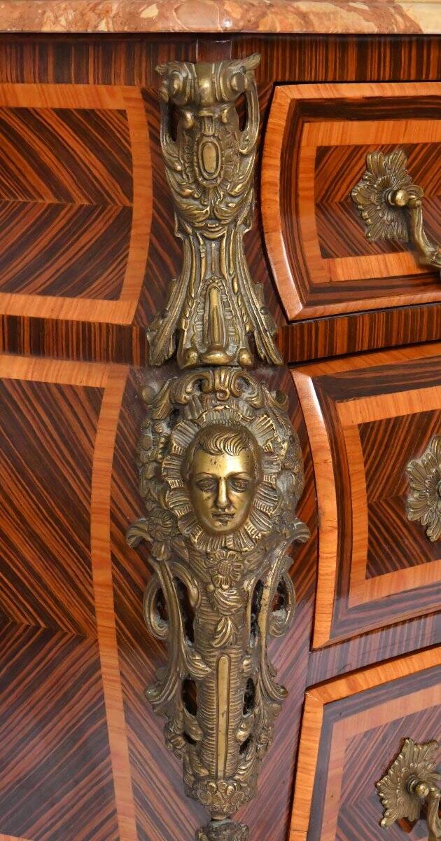 Tomb-shaped commode in Louis XV style with decoration featuring Spanish figures.