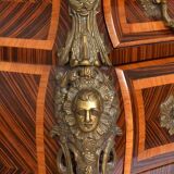 Tomb-shaped commode in Louis XV style with decoration featuring Spanish figures.