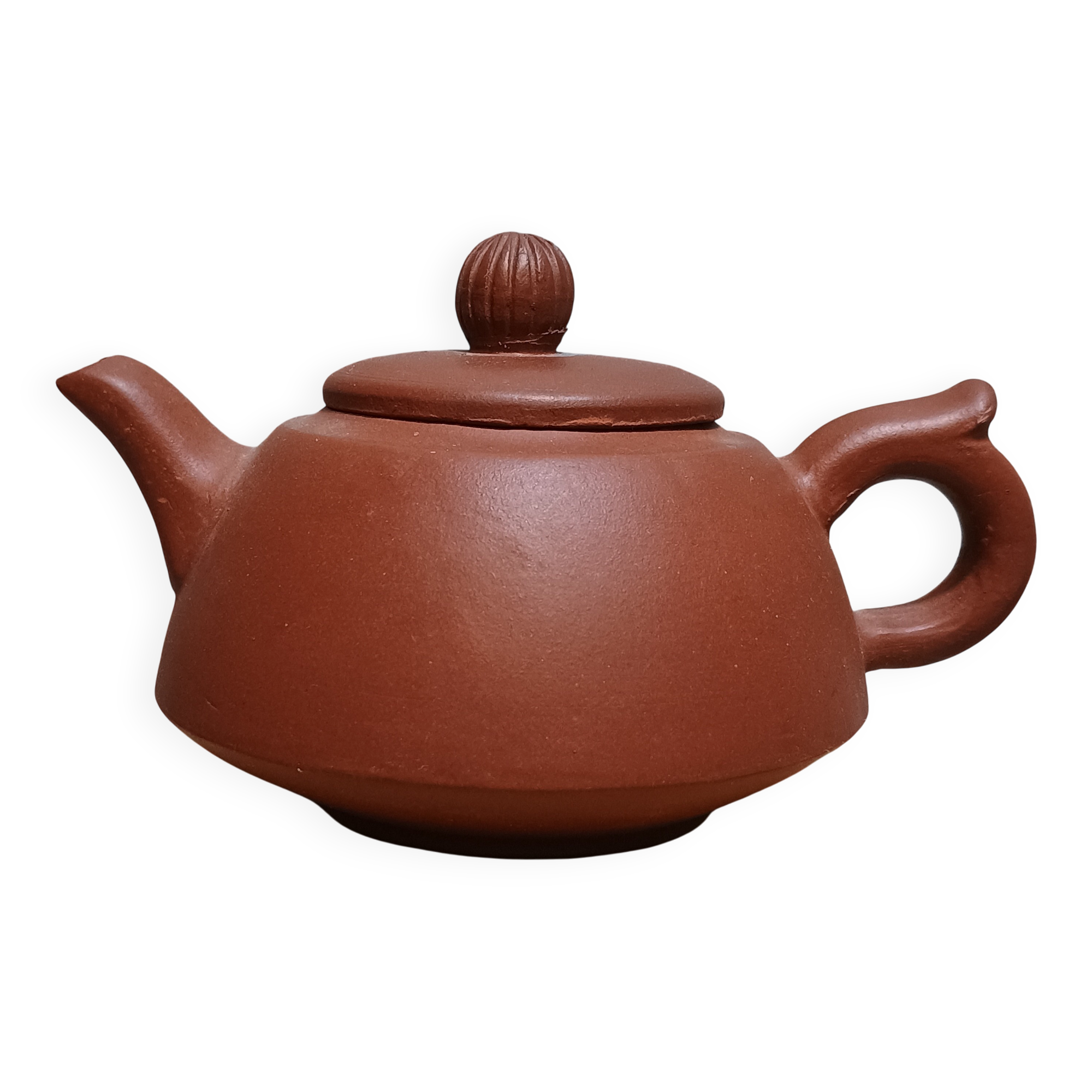 Yixing teapot in signed red clay