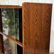 Small English oak library from the 1960s with sliding doors.