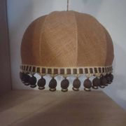 Large hanging pendant light with a burlap and pom-pom style