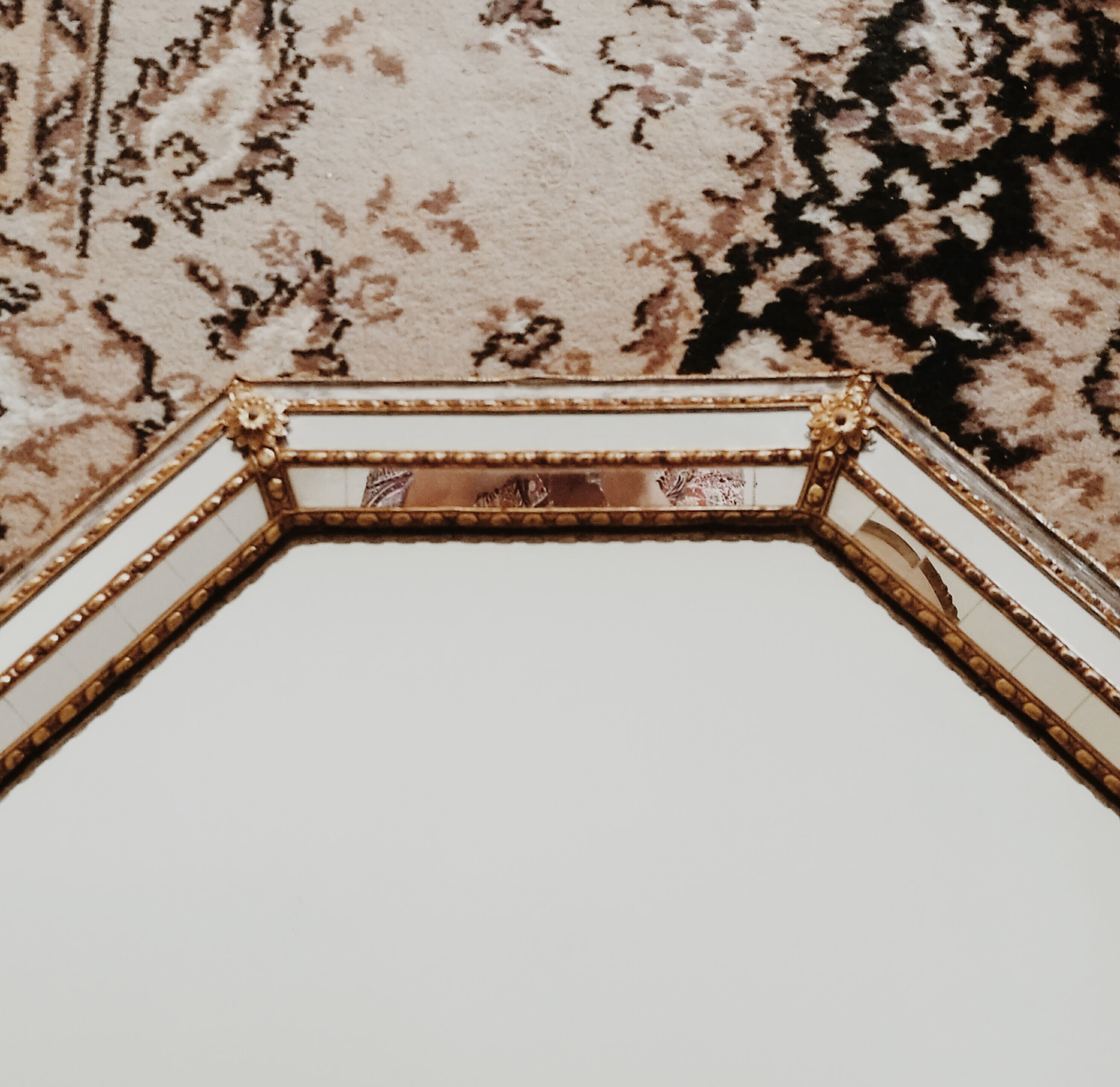 Old mirror with parecloses