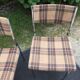 Vintage chairs and stools with chrome-plated square tubular metal base.