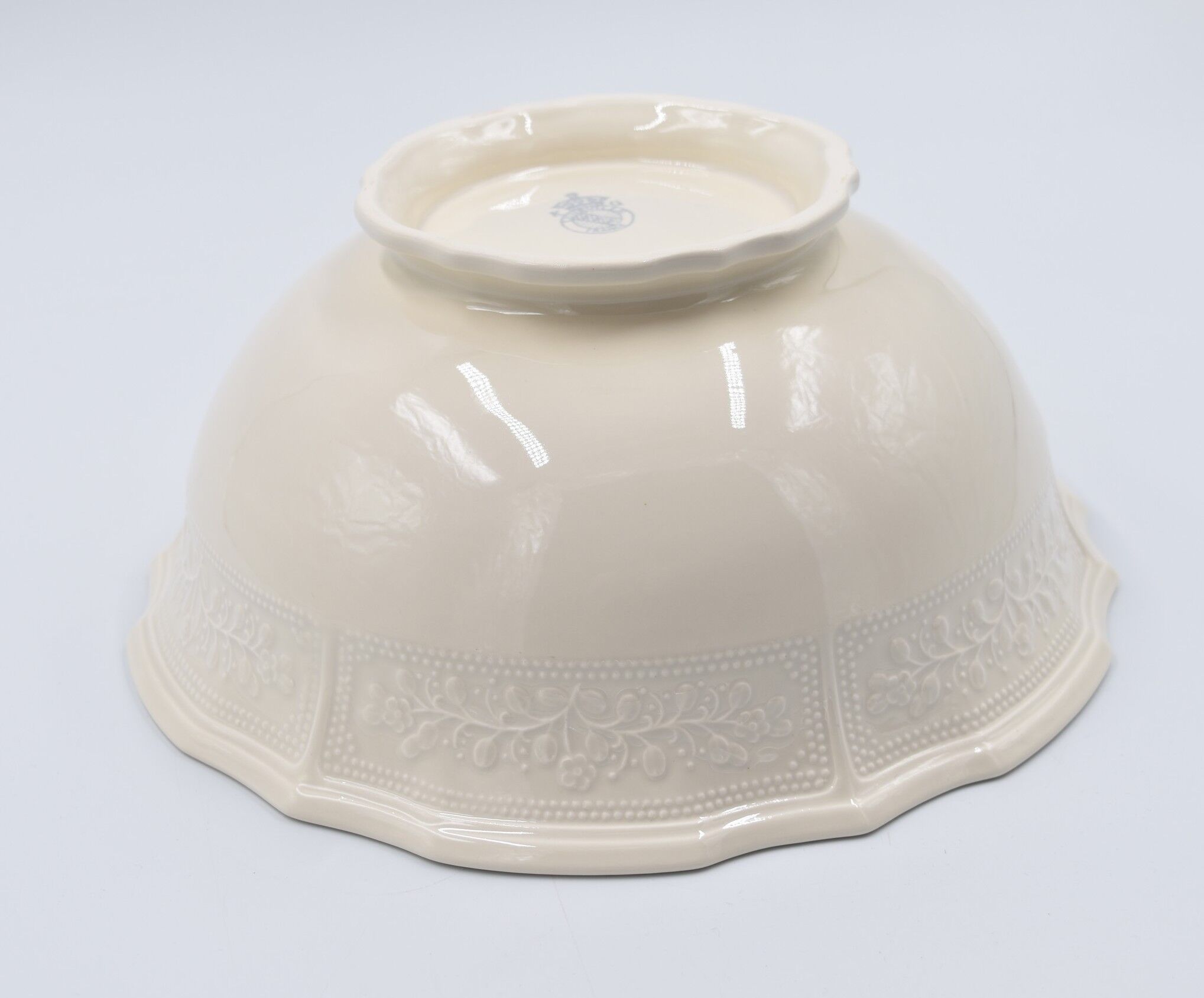 Salad bowl in off-white earthenware ivory Lunéville decoration in relief France