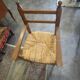 Wooden and straw high chair for children